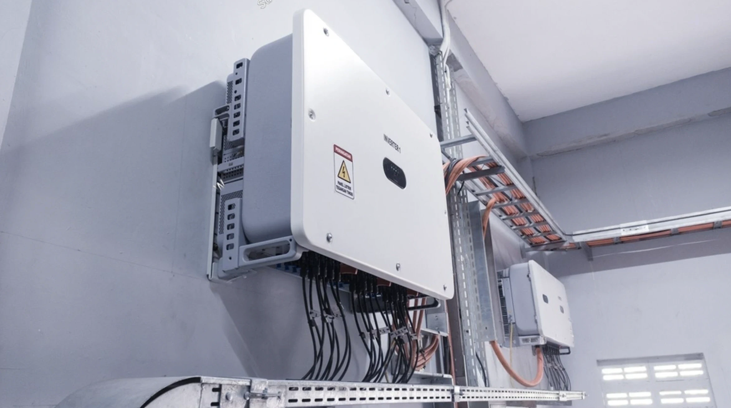 A Sunlith Power engineer completing a solar inverter installation